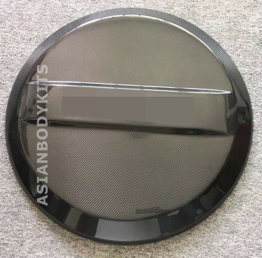 Buy Now Carbon Fiber Spare Wheel Tire Cover For Mercedes Benz W463 G-Class G500 G55 G63 and upgrade car parts from SIR Tuning at the Best Price. Headlights, Tail lights, Bodykits, Navigations, Carbon body kit and more - Fast & Free Shipping within Europe, US & Worldwide.