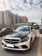 Buy Now CARBON HOOD BONNET for MERCEDES BENZ C CLASS W205 C160 C180 C200 C250 C300 C400 C450 C43 C63 2015 - 2023 and upgrade car parts from SIR Tuning at the Best Price. Headlights, Tail lights, Bodykits, Navigations, body kit and more - Fast & Free Shipping within Europe, US & Worldwide.