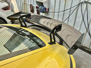 Buy Now DRY CARBON FIBER REAR WING SPOILER for PORSCHE 718 982 CAYMAN COUPE 2016 - 2025 and upgrade car parts from SIR Tuning at the Best Price. Headlights, Tail lights, Bodykits, Navigations, body kit and more - Fast & Free Shipping within Europe, US & Worldwide.
