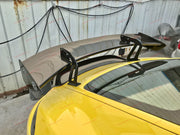 Buy Now DRY CARBON FIBER REAR WING SPOILER for PORSCHE 718 982 CAYMAN COUPE 2016 - 2025 and upgrade car parts from SIR Tuning at the Best Price. Headlights, Tail lights, Bodykits, Navigations, body kit and more - Fast & Free Shipping within Europe, US & Worldwide.
