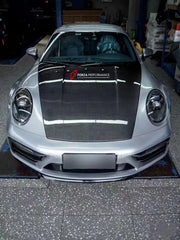 Buy Now DRY CARBON HOOD BONNET for PORSCHE 911 992.1 CARRERA 2019 - 2025 and upgrade car parts from SIR Tuning at the Best Price. Headlights, Tail lights, Bodykits, Navigations, body kit and more - Fast & Free Shipping within Europe, US & Worldwide.