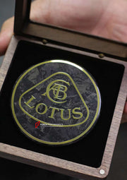 Buy Now FORGED CARBON HOOD EMBLEM LOGO for LOTUS EMIRA | ELETRE and upgrade car parts from SIR Tuning at the Best Price. Headlights, Tail lights, Bodykits, Navigations, Carbon body kit and more - Fast & Free Shipping within Europe, US & Worldwide.