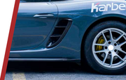 Buy Now AUTHENTIC KARBEL CARBON SIDE AIR VENTS COVERS for PORSCHE 718 BOXSTER CAYMAN 982 2016+ and upgrade car parts from SIR Tuning at the Best Price. Headlights, Tail lights, Bodykits, Navigations, Carbon body kit and more - Fast & Free Shipping within Europe, US & Worldwide.