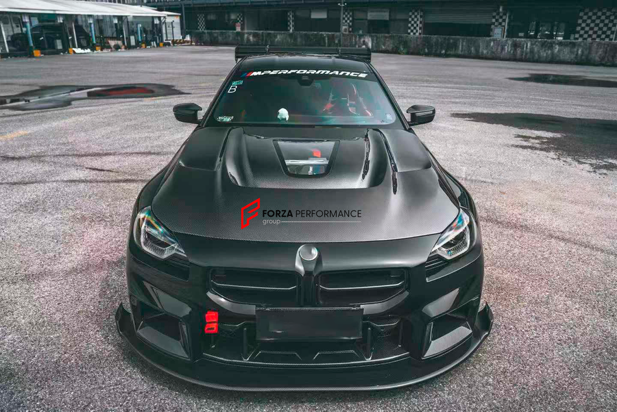 Buy Now TRANSPARENT DRY CARBON FIBER HOOD for BMW M2 G87 2023+ and upgrade car parts from SIR Tuning at the Best Price. Headlights, Tail lights, Bodykits, Navigations, body kit and more - Fast & Free Shipping within Europe, US & Worldwide.