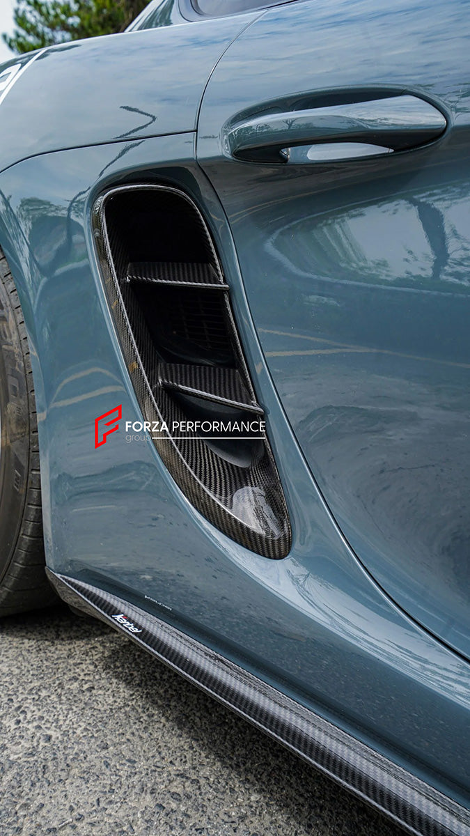 Buy Now AUTHENTIC KARBEL CARBON SIDE AIR VENTS COVERS for PORSCHE 718 BOXSTER CAYMAN 982 2016+ and upgrade car parts from SIR Tuning at the Best Price. Headlights, Tail lights, Bodykits, Navigations, Carbon body kit and more - Fast & Free Shipping within Europe, US & Worldwide.