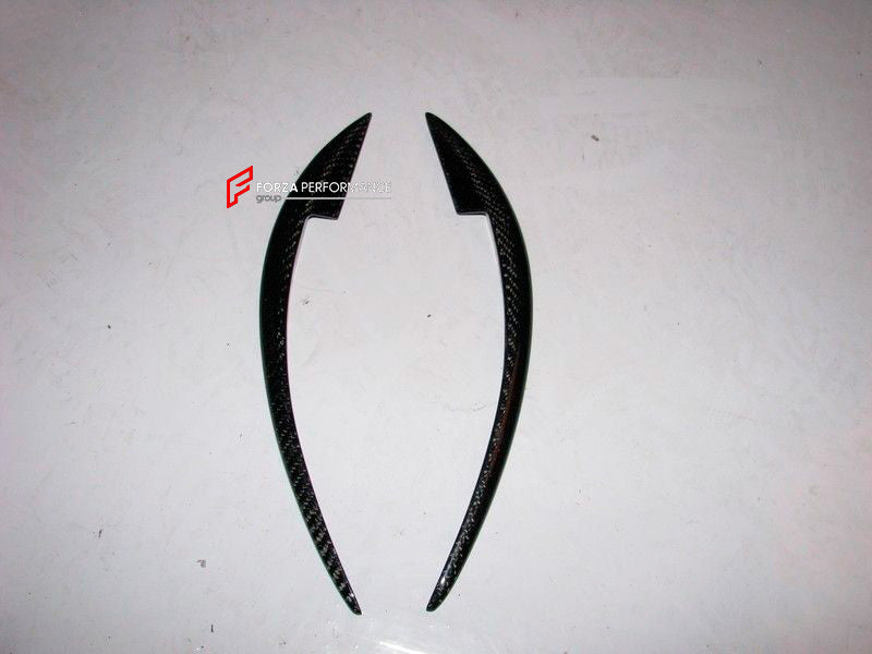 Buy Now CARBON FRONT BUMPER CANARDS for FERRARI 458 ITALIA SPIDER 2009 - 2015 and upgrade car parts from SIR Tuning at the Best Price. Headlights, Tail lights, Bodykits, Navigations, body kit and more - Fast & Free Shipping within Europe, US & Worldwide.