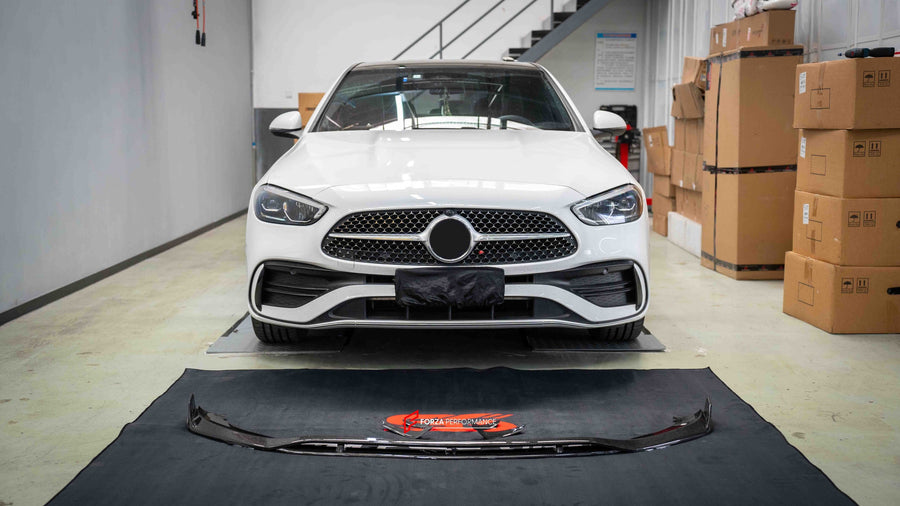 Buy Now CARBON FRONT LIP CANARDS FOR MERCEDES-BENZ W206 C-CLASS 2021+ and upgrade car parts from SIR Tuning at the Best Price. Headlights, Tail lights, Bodykits, Navigations, body kit and more - Fast & Free Shipping within Europe, US & Worldwide.