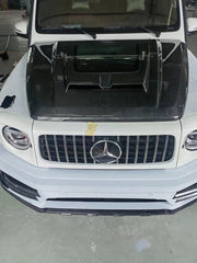 Buy Now TRANSPARENT CARBON HOOD BONNET FOR MERCEDES BENZ G CLASS W464 G400 G500 G63 2018+ and upgrade car parts from SIR Tuning at the Best Price. Headlights, Tail lights, Bodykits, Navigations, Carbon body kit and more - Fast & Free Shipping within Europe, US & Worldwide.