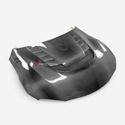Buy Now CARBON HOOD BONNET for TOYOTA GR SUPRA A90 2019+ and upgrade car parts from SIR Tuning at the Best Price. Headlights, Tail lights, Bodykits, Navigations, body kit and more - Fast & Free Shipping within Europe, US & Worldwide.
