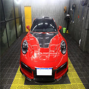Buy Now CARBON HOOD BONNET for PORSCHE 911 992.1 2019 - 2025 and upgrade car parts from SIR Tuning at the Best Price. Headlights, Tail lights, Bodykits, Navigations, body kit and more - Fast & Free Shipping within Europe, US & Worldwide.