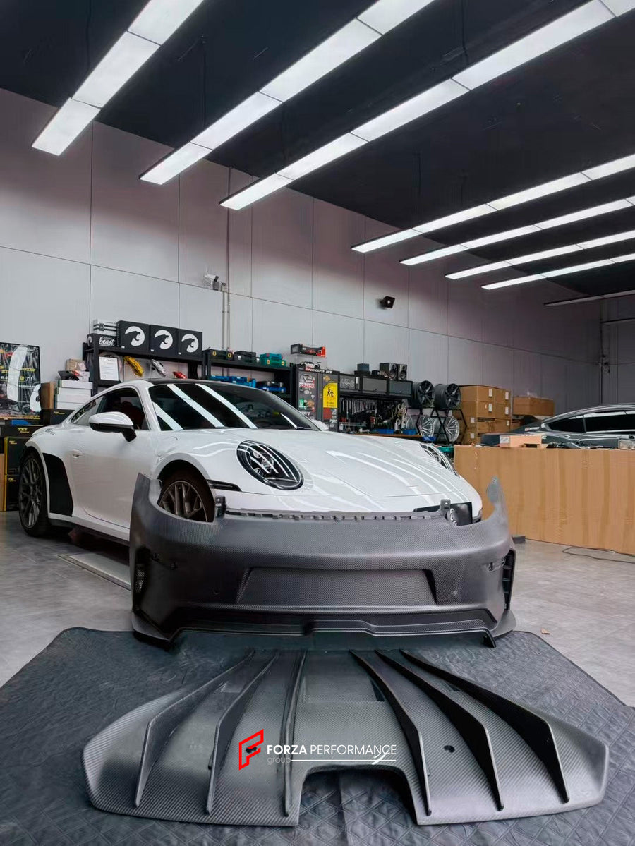 Buy Now CONVERSION CARBON REAR BUMPER WITH DIFFUSER for PORSCHE 911 992.1 CARRERA 2019+ UPGRADE to 911 992.2 GT3 2025+ FACELIFT and upgrade car parts from SIR Tuning at the Best Price. Headlights, Tail lights, Bodykits, Navigations, Carbon body kit and more - Fast & Free Shipping within Europe, US & Worldwide.