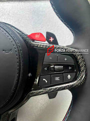 Buy Now CUSTOM CARBON STEERING WHEEL with PADDLE SHIFTERS for BMW M5 F90 and upgrade car parts from SIR Tuning at the Best Price. Headlights, Tail lights, Bodykits, Navigations, steering wheel and more - Fast & Free Shipping within Europe, US & Worldwide.