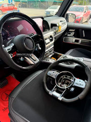 Buy Now CUSTOM STEERING WHEEL for MERCEDES BENZ G-CLASS W465 G450 G350 G500 G550 AMG G63 2024+ and upgrade car parts from SIR Tuning at the Best Price. Headlights, Tail lights, Bodykits, Navigations, steering wheel and more - Fast & Free Shipping within Europe, US & Worldwide.