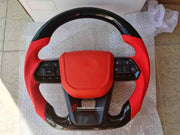 Buy Now CUSTOM STEERING WHEEL for TOYOTA LAND CRUISER 250 300 LC250 LC300 and upgrade car parts from SIR Tuning at the Best Price. Headlights, Tail lights, Bodykits, Navigations, AO-steering wheel and more - Fast & Free Shipping within Europe, US & Worldwide.