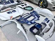 Buy Now DRY CARBON BODY KIT for FERRARI SF90 2019+ and upgrade car parts from SIR Tuning at the Best Price. Headlights, Tail lights, Bodykits, Navigations, body kit and more - Fast & Free Shipping within Europe, US & Worldwide.
