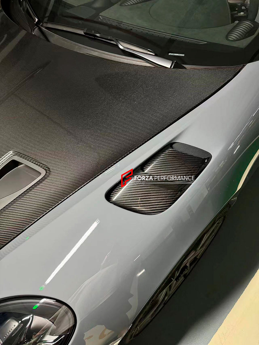 Buy Now DRY CARBON FENDER AIR OUTLET TRIM for PORSCHE 718 982 GT4RS and upgrade car parts from SIR Tuning at the Best Price. Headlights, Tail lights, Bodykits, Navigations, body kit and more - Fast & Free Shipping within Europe, US & Worldwide.