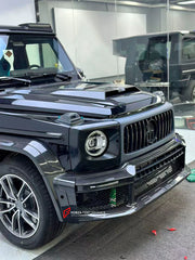Buy Now DRY CARBON FRONT BUMPER WITH LIP for MERCEDES BENZ AMG G63 W465 G350 G500 G550 AMG G63 2024+ and upgrade car parts from SIR Tuning at the Best Price. Headlights, Tail lights, Bodykits, Navigations, body kit and more - Fast & Free Shipping within Europe, US & Worldwide.