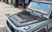 Buy Now DRY CARBON HOOD BONNET for MERCEDES BENZ G CLASS W464 2018 - 2024 and upgrade car parts from SIR Tuning at the Best Price. Headlights, Tail lights, Bodykits, Navigations, body kit and more - Fast & Free Shipping within Europe, US & Worldwide.