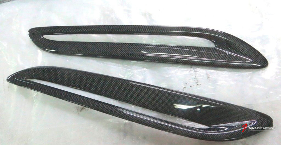 Buy Now DRY CARBON HOOD BONNET SCOOP TRIMS for BENTLEY CONTINENTAL SUPERSPORTS 2009 - 2012 and upgrade car parts from SIR Tuning at the Best Price. Headlights, Tail lights, Bodykits, Navigations, body kit and more - Fast & Free Shipping within Europe, US & Worldwide.