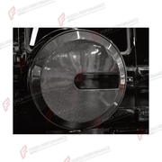 Buy Now DRY CARBON SPARE WHEEL TIRE COVER for MERCEDES-BENZ G-CLASS W465 G63 G450D G500 G550 2025+ and upgrade car parts from SIR Tuning at the Best Price. Headlights, Tail lights, Bodykits, Navigations, Body Kit and more - Fast & Free Shipping within Europe, US & Worldwide.