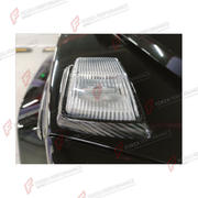 Buy Now DRY CARBON TURN SIGNAL LIGHT COVERS for MERCEDES-BENZ G-CLASS W465 G63 G450D G500 G550 2025+ and upgrade car parts from SIR Tuning at the Best Price. Headlights, Tail lights, Bodykits, Navigations, Body Kit and more - Fast & Free Shipping within Europe, US & Worldwide.