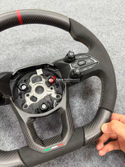 Buy Now GENUINE LAMBORGHINI CARBON ALCANTARA STEERING WHEEL for LAMBORGHINI REVUELTO 2023+ and upgrade car parts from SIR Tuning at the Best Price. Headlights, Tail lights, Bodykits, Navigations, body kit and more - Fast & Free Shipping within Europe, US & Worldwide.