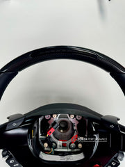 Buy Now GENUINE OEM FERRARI COMPLETE STEERING WHEEL for FERRARI SF90 296 and upgrade car parts from SIR Tuning at the Best Price. Headlights, Tail lights, Bodykits, Navigations, body kit and more - Fast & Free Shipping within Europe, US & Worldwide.