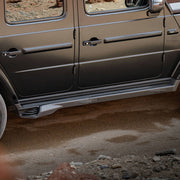 Buy Now NORLUND ELECTRIC SIDE STEP WITH EXHAUST SYSTEM for MERCEDES-BENZ G-CLASS G63 G500 W463 2018+ and upgrade car parts from SIR Tuning at the Best Price. Headlights, Tail lights, Bodykits, Navigations, Carbon body kit and more - Fast & Free Shipping within Europe, US & Worldwide.
