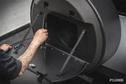 Buy Now PLUMB DRY CARBON SPARE TIRE STORAGE for LAND ROVER DEFENDER 90 110 130 L663 2019+ and upgrade car parts from SIR Tuning at the Best Price. Headlights, Tail lights, Bodykits, Navigations, Carbon body kit and more - Fast & Free Shipping within Europe, US & Worldwide.