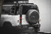 Buy Now PLUMB DRY CARBON SPARE TIRE STORAGE for LAND ROVER DEFENDER 90 110 130 L663 2019+ and upgrade car parts from SIR Tuning at the Best Price. Headlights, Tail lights, Bodykits, Navigations, Carbon body kit and more - Fast & Free Shipping within Europe, US & Worldwide.