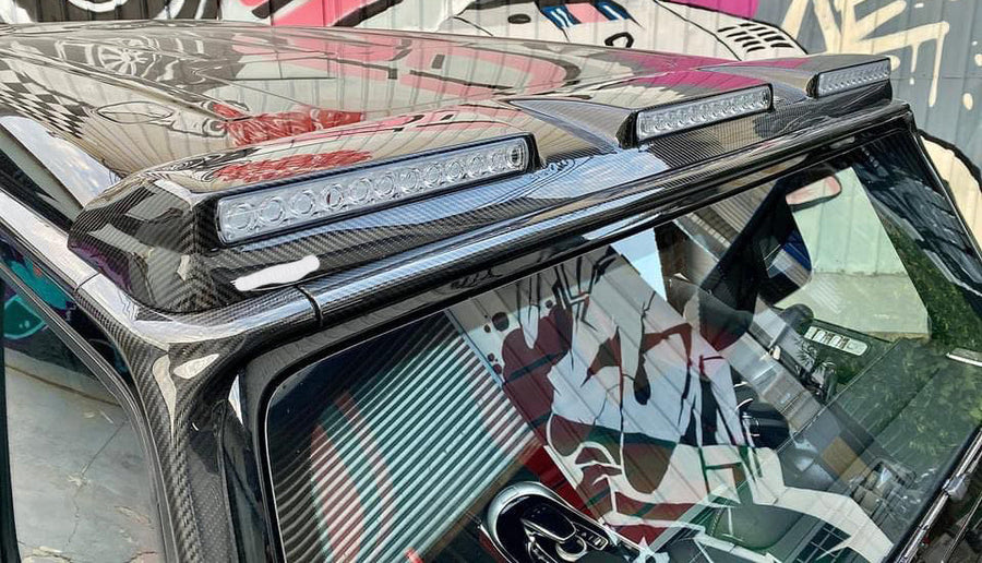 Buy Now DRY CARBON ROOF LIGHT BAR with LED DRL for MERCEDES BENZ G63 G550 W463A W464 2018+ and upgrade car parts from SIR Tuning at the Best Price. Headlights, Tail lights, Bodykits, Navigations, body kit and more - Fast & Free Shipping within Europe, US & Worldwide.