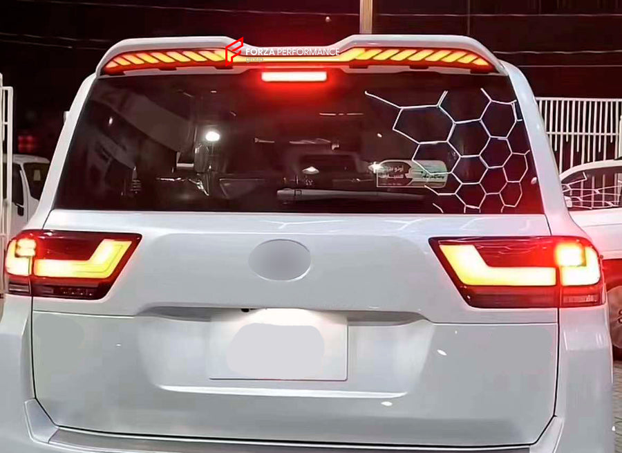 Buy Now ROOF REAR SPOILER WITH DYNAMIC LED LIGHTS for TOYOTA LAND CRUISER 300 LC300 2021+ and upgrade car parts from SIR Tuning at the Best Price. Headlights, Tail lights, Bodykits, Navigations, body kit and more - Fast & Free Shipping within Europe, US & Worldwide.