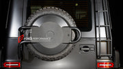 Buy Now SPARE TIRE COVER WITH HOLDER for MERCEDES BENZ G CLASS W465 G450 G350 G500 G550 AMG G63 2024+ and upgrade car parts from SIR Tuning at the Best Price. Headlights, Tail lights, Bodykits, Navigations, body kit and more - Fast & Free Shipping within Europe, US & Worldwide.