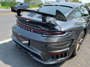 Buy Now DRY CARBON REAR BUMPER FOR PORSCHE 992 CARRERA 2019 - 2025 and upgrade car parts from SIR Tuning at the Best Price. Headlights, Tail lights, Bodykits, Navigations, body kit and more - Fast & Free Shipping within Europe, US & Worldwide.