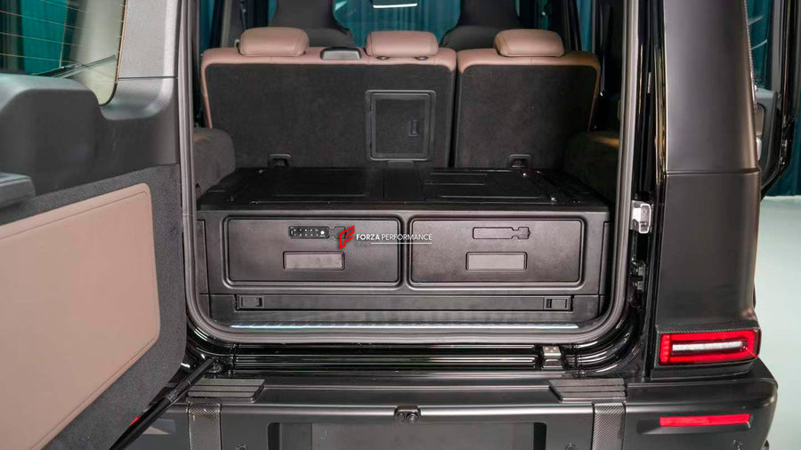Buy Now TRUNK STORAGE with TABLE and FOLDING CHAIR for MERCEDES-BENZ G-CLASS G63 G550 G500 W465 2024+ and upgrade car parts from SIR Tuning at the Best Price. Headlights, Tail lights, Bodykits, Navigations, Carbon body kit and more - Fast & Free Shipping within Europe, US & Worldwide.