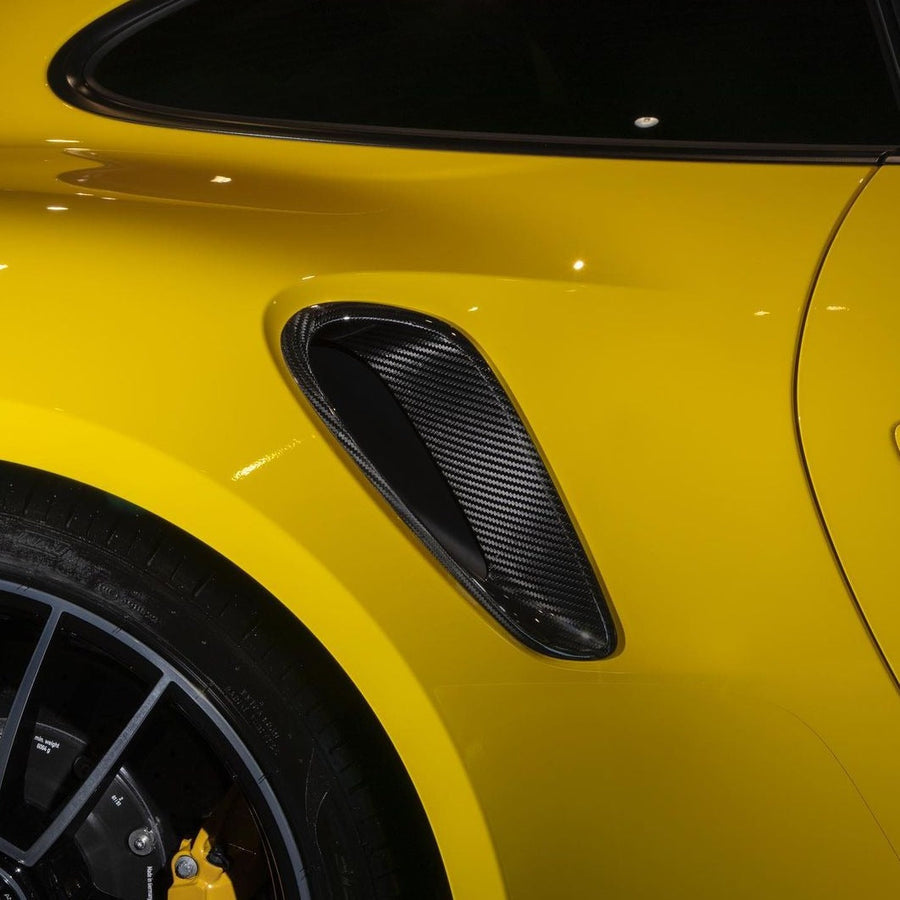 Buy Now CARBON REAR FENDER AIR VENT SCOOP COVERS for PORSCHE 911 992.1 TURBO TURBO S 2019 - 2025 and upgrade car parts from SIR Tuning at the Best Price. Headlights, Tail lights, Bodykits, Navigations, body kit and more - Fast & Free Shipping within Europe, US & Worldwide.