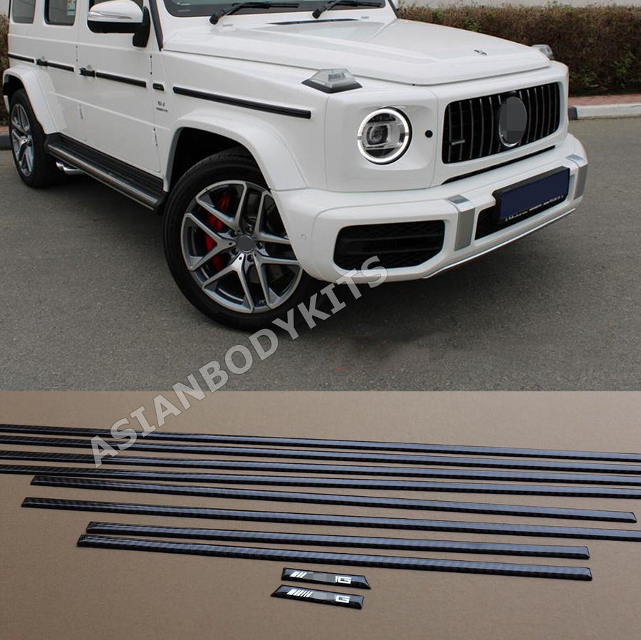 Buy Now CARBON SIDE MOLDING for MERCEDES BENZ G CLASS W463A W464 G500 G550 G63 2018 - 2024 and upgrade car parts from SIR Tuning at the Best Price. Headlights, Tail lights, Bodykits, Navigations, body kit and more - Fast & Free Shipping within Europe, US & Worldwide.