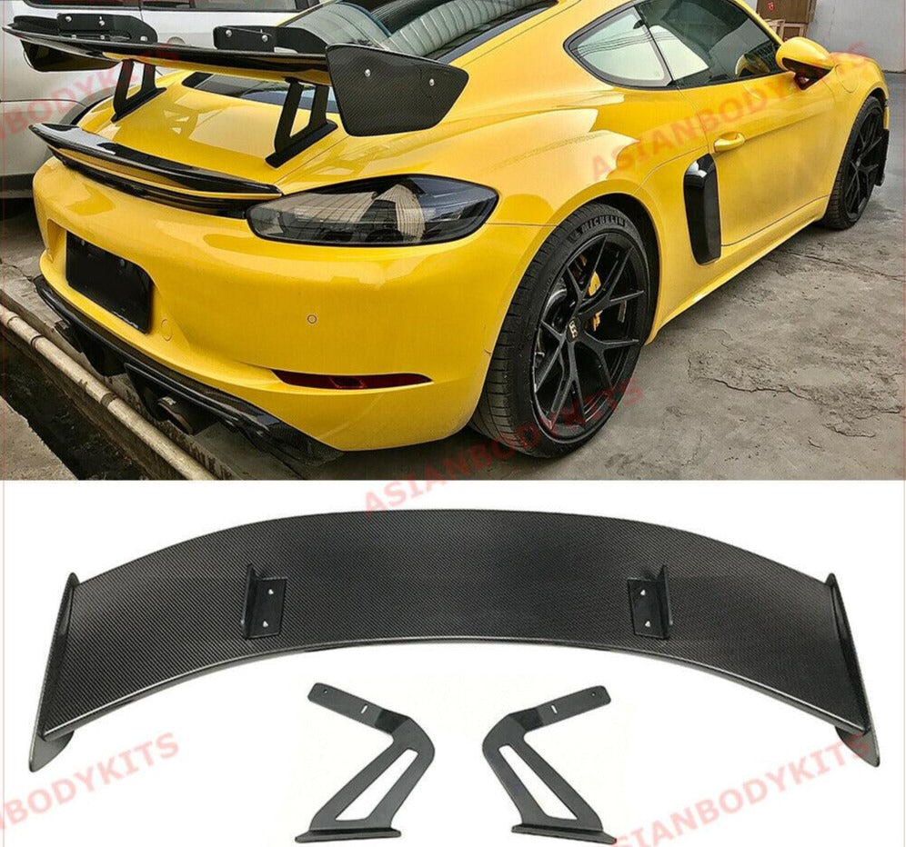 Buy Now DRY CARBON FIBER REAR WING SPOILER for PORSCHE 718 982 CAYMAN COUPE 2016 - 2025 and upgrade car parts from SIR Tuning at the Best Price. Headlights, Tail lights, Bodykits, Navigations, body kit and more - Fast & Free Shipping within Europe, US & Worldwide.