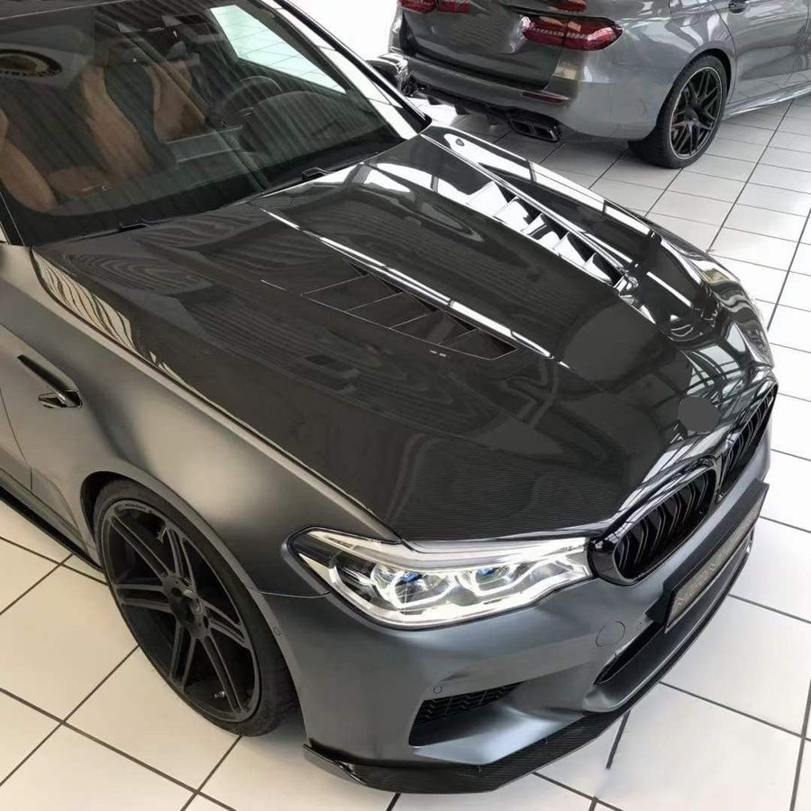Buy Now DRY CARBON HOOD for BMW M5 F90 and 5-SERIES G30 G38 | V STYLE and upgrade car parts from SIR Tuning at the Best Price. Headlights, Tail lights, Bodykits, Navigations, body kit and more - Fast & Free Shipping within Europe, US & Worldwide.