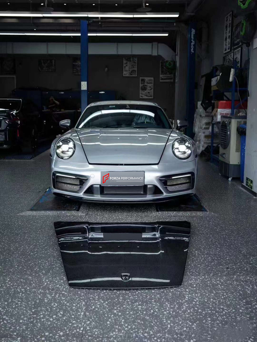 Buy Now DRY CARBON HOOD BONNET for PORSCHE 911 992.1 CARRERA 2019 - 2025 and upgrade car parts from SIR Tuning at the Best Price. Headlights, Tail lights, Bodykits, Navigations, body kit and more - Fast & Free Shipping within Europe, US & Worldwide.