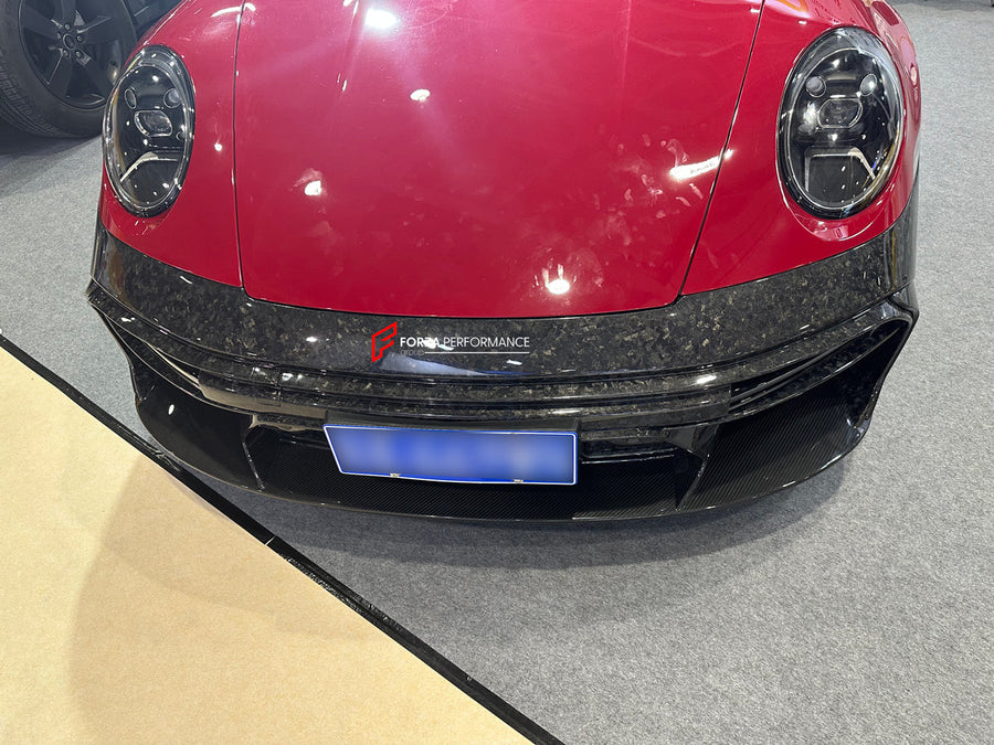 Buy Now FORGED CARBON FRONT BUMPER for PORSCHE 911 992.1 2019 - 2025 and upgrade car parts from SIR Tuning at the Best Price. Headlights, Tail lights, Bodykits, Navigations, body kit and more - Fast & Free Shipping within Europe, US & Worldwide.