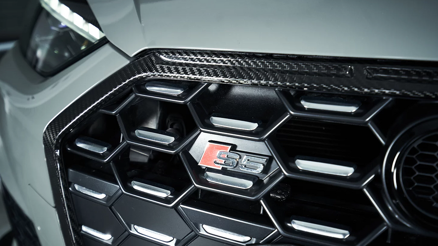 Buy Now KARBEL CARBON DRY CARBON FIBER FRONT GRILL FRAME FOR AUDI S5 & A5 S LINE 2020-ON B9.5 and upgrade car parts from SIR Tuning at the Best Price. Headlights, Tail lights, Bodykits, Navigations, car parts and more - Fast & Free Shipping within Europe, US & Worldwide.