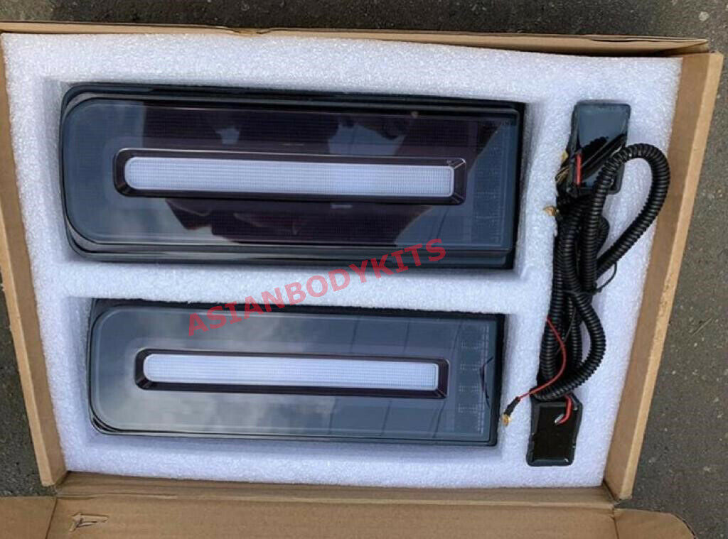 Buy Now SMOKED TAIL LIGHTS for Mercedes Benz G-class W463 1990 - 2017 | "W464 2019+" style and upgrade car parts from SIR Tuning at the Best Price. Headlights, Tail lights, Bodykits, Navigations, Carbon body kit and more - Fast & Free Shipping within Europe, US & Worldwide.