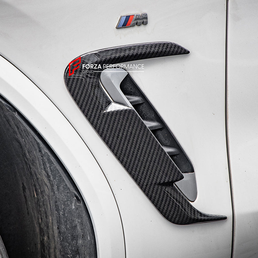 Buy Now AUTHENTIC SOOQOO CARBON FRONT FENDER TRIMS for BMW X3 G01 LCI 2022-2024 X4 G02 LCI 2022+ iX3 G08 LCI 2022+ and upgrade car parts from SIR Tuning at the Best Price. Headlights, Tail lights, Bodykits, Navigations, body kit and more - Fast & Free Shipping within Europe, US & Worldwide.