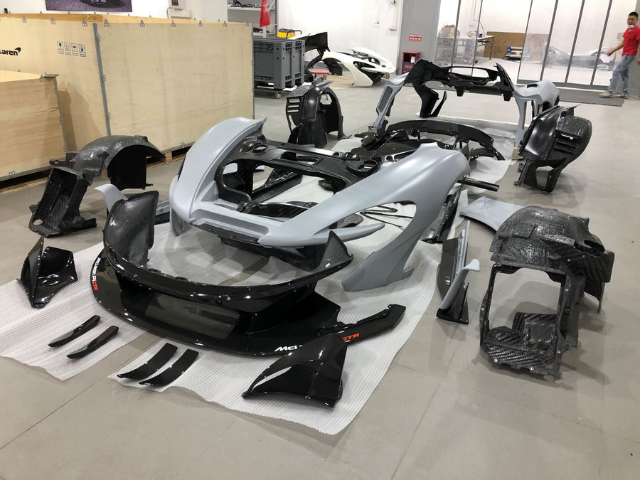 Buy Now CONVERSION DRY CARBON BODY KIT for MCLAREN P1 2013 - 2016 UPGRADE to P1 GTR and upgrade car parts from SIR Tuning at the Best Price. Headlights, Tail lights, Bodykits, Navigations, Carbon body kit and more - Fast & Free Shipping within Europe, US & Worldwide.
