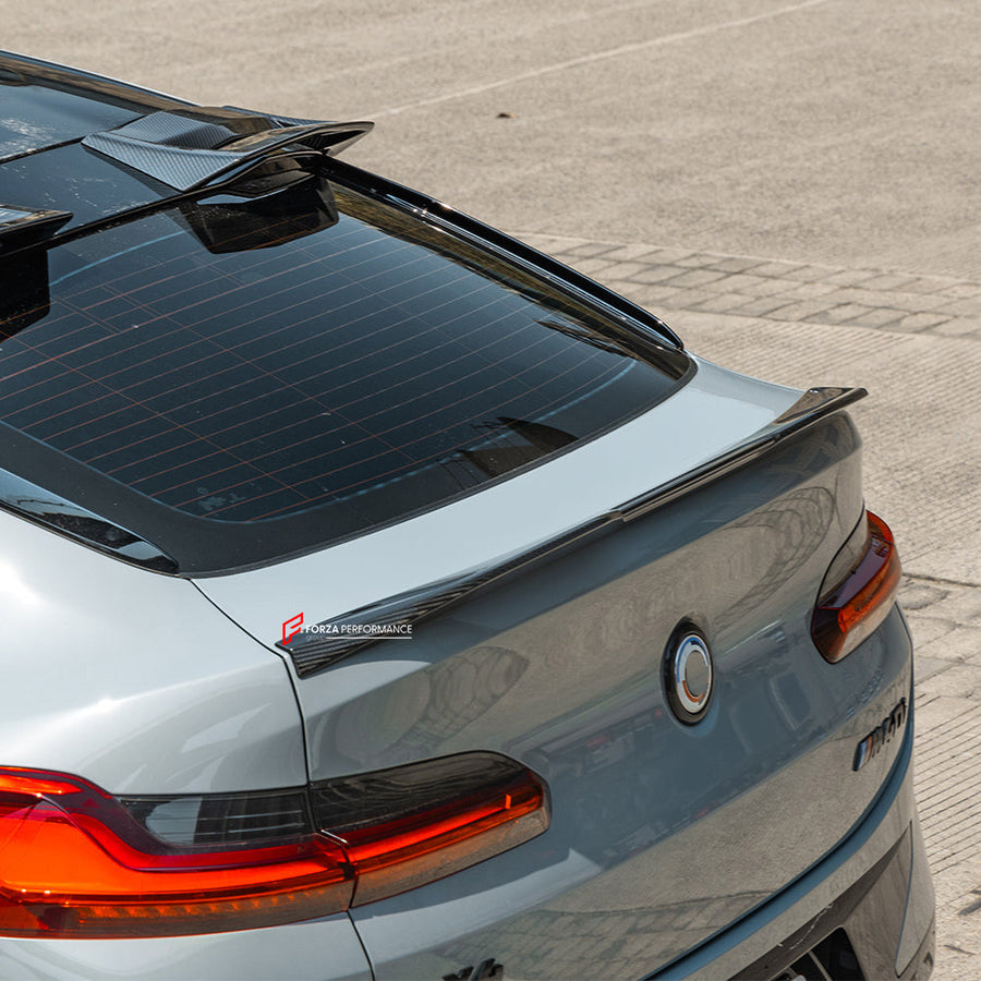 Buy Now AUTHENTIC SOOQOO DRY CARBON REAR SPOILER for BMW X4M F98 LCI 2022+ and upgrade car parts from SIR Tuning at the Best Price. Headlights, Tail lights, Bodykits, Navigations, body kit and more - Fast & Free Shipping within Europe, US & Worldwide.