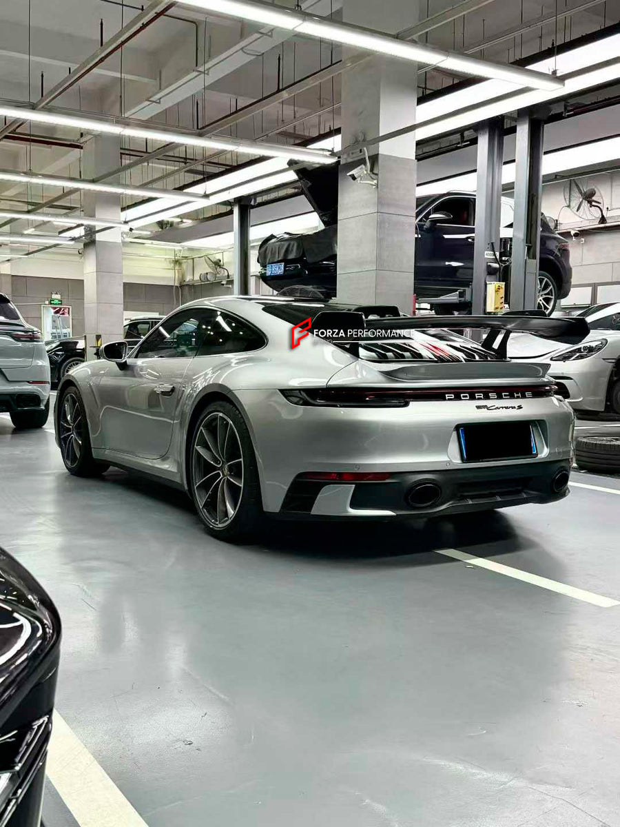Buy Now DRY CARBON REAR WING SPOILER with ENGINE LID for PORSCHE 911 992.1 CARRERA 2019 - 2024 upgrade to GT3 and upgrade car parts from SIR Tuning at the Best Price. Headlights, Tail lights, Bodykits, Navigations, body kit and more - Fast & Free Shipping within Europe, US & Worldwide.